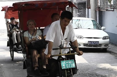 visiting Beijing hutongs by a richshaw