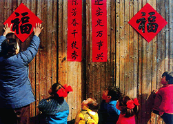 Pasting Couplets on Chinese New Year Eve 